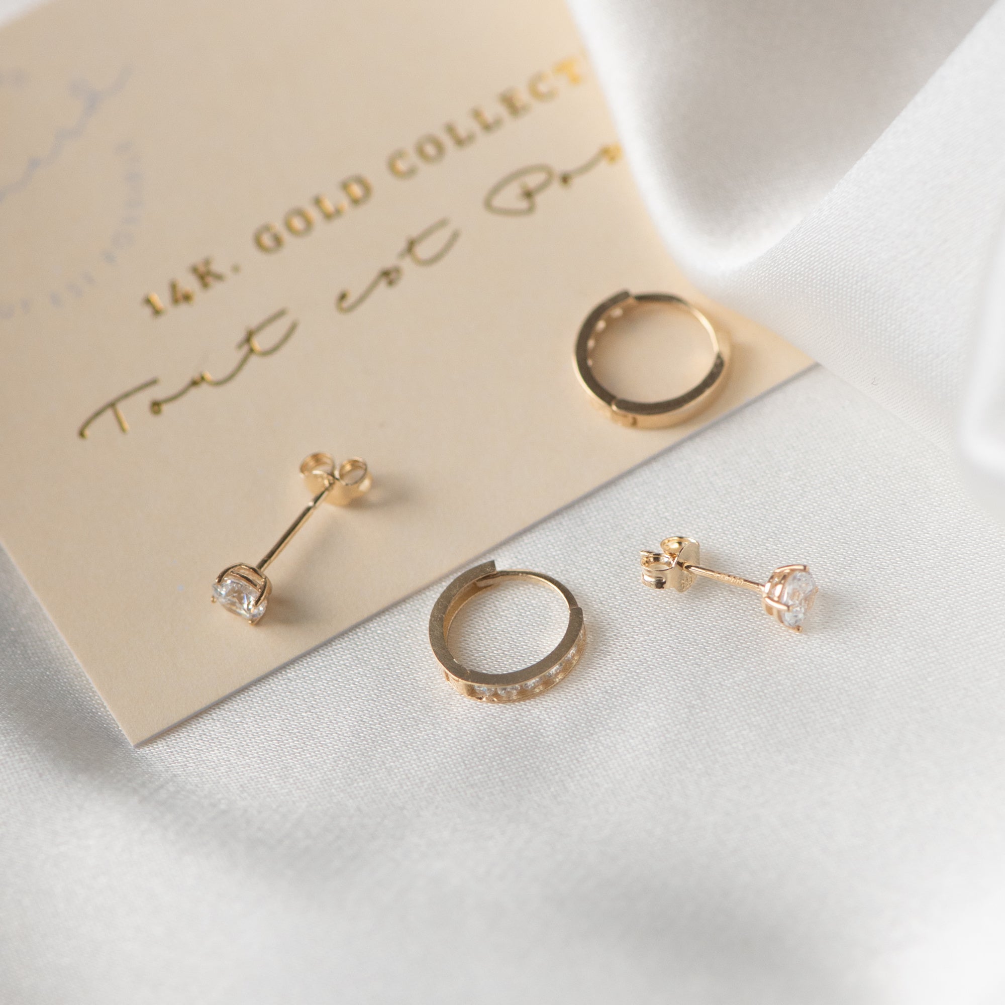 Cadeau d'Isabel 14 karat gold earring set with zirconia stones
