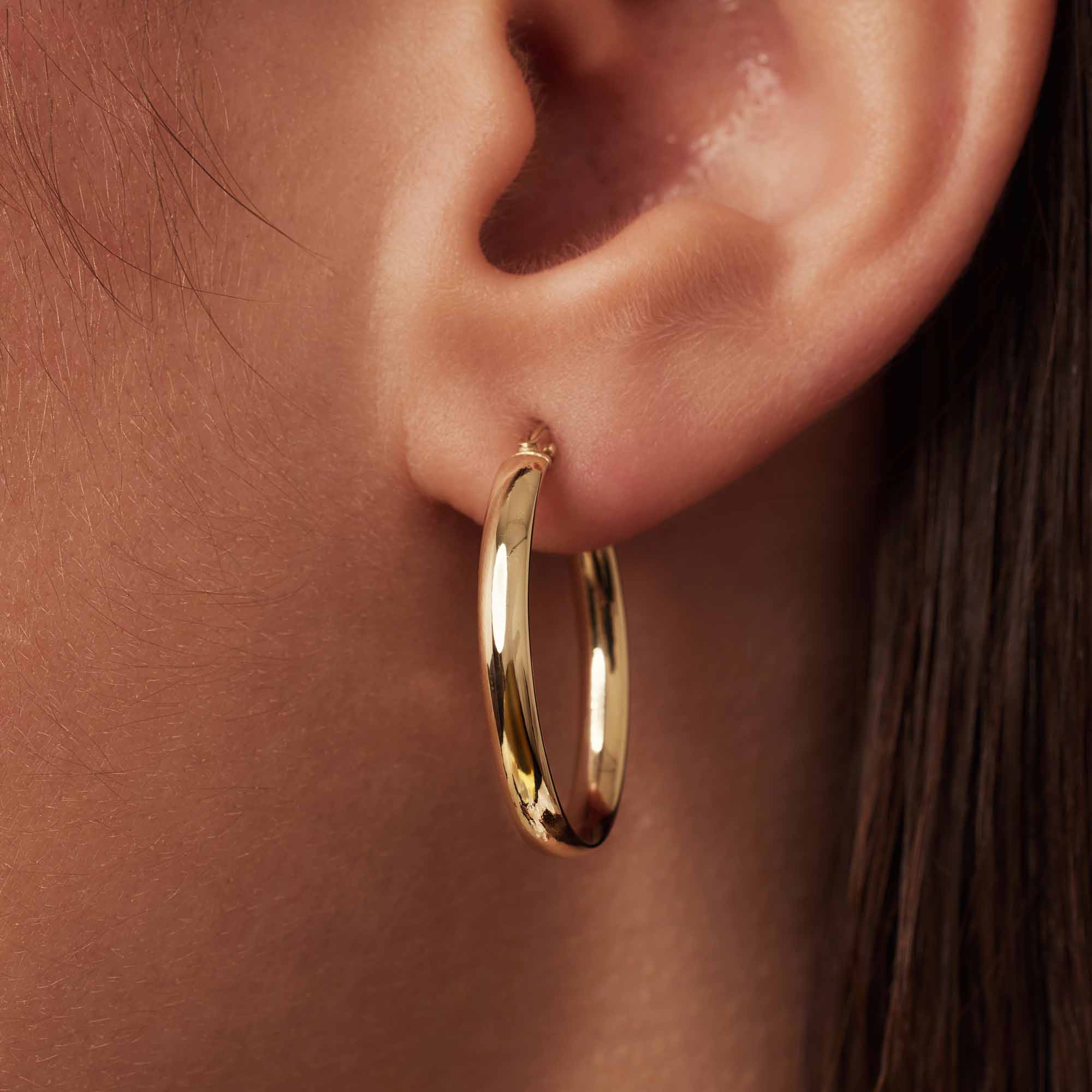 Rivoli Estrella 14 karat gold hoop earrings (23 mm)
