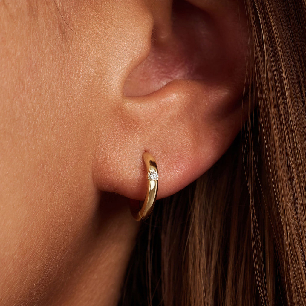 De la Paix Mia 14 karat gold Earrings with diamond 0.06 carat