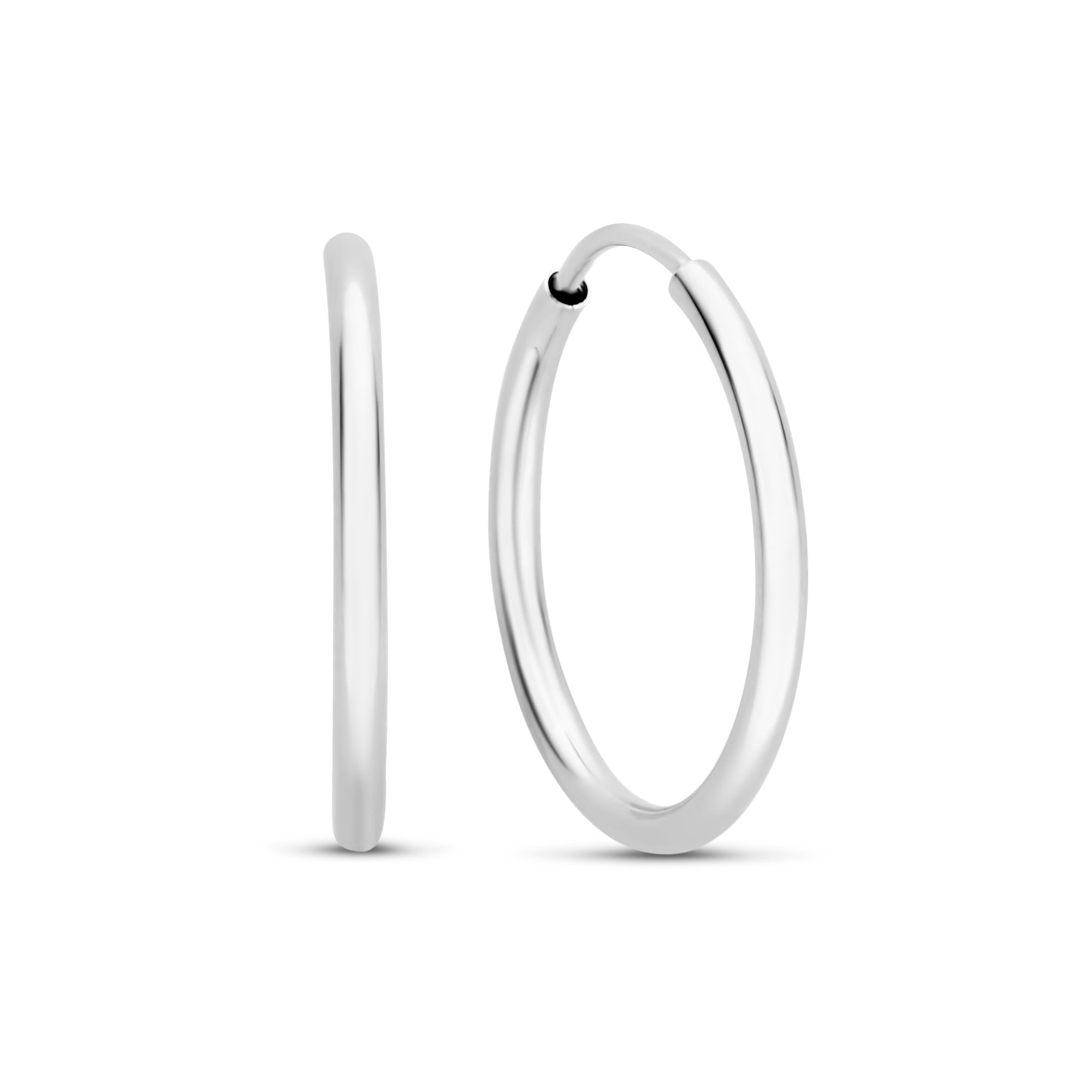 Cadeau d'Isabel 14 karat white gold earring set