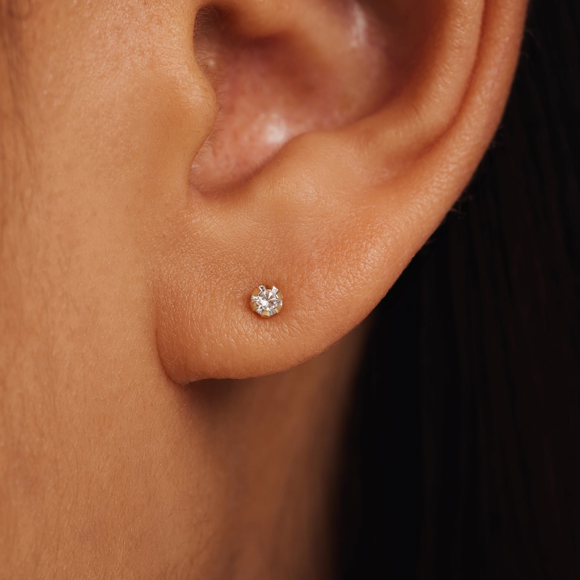 Le Marais De Buci 14 karat gold ear studs with zirconia stones
