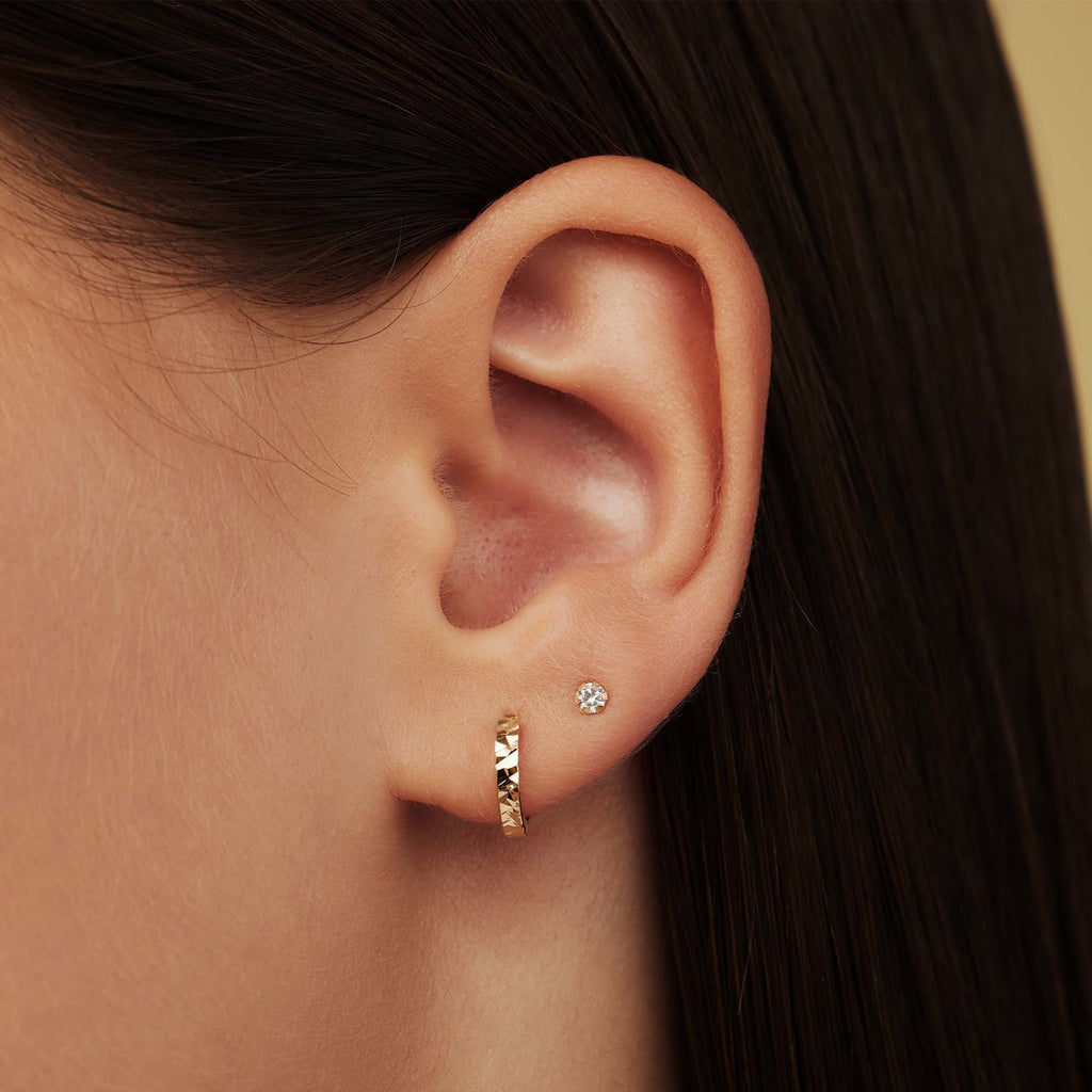 Le Marais De Buci 14 karat gold ear studs with zirconia stones