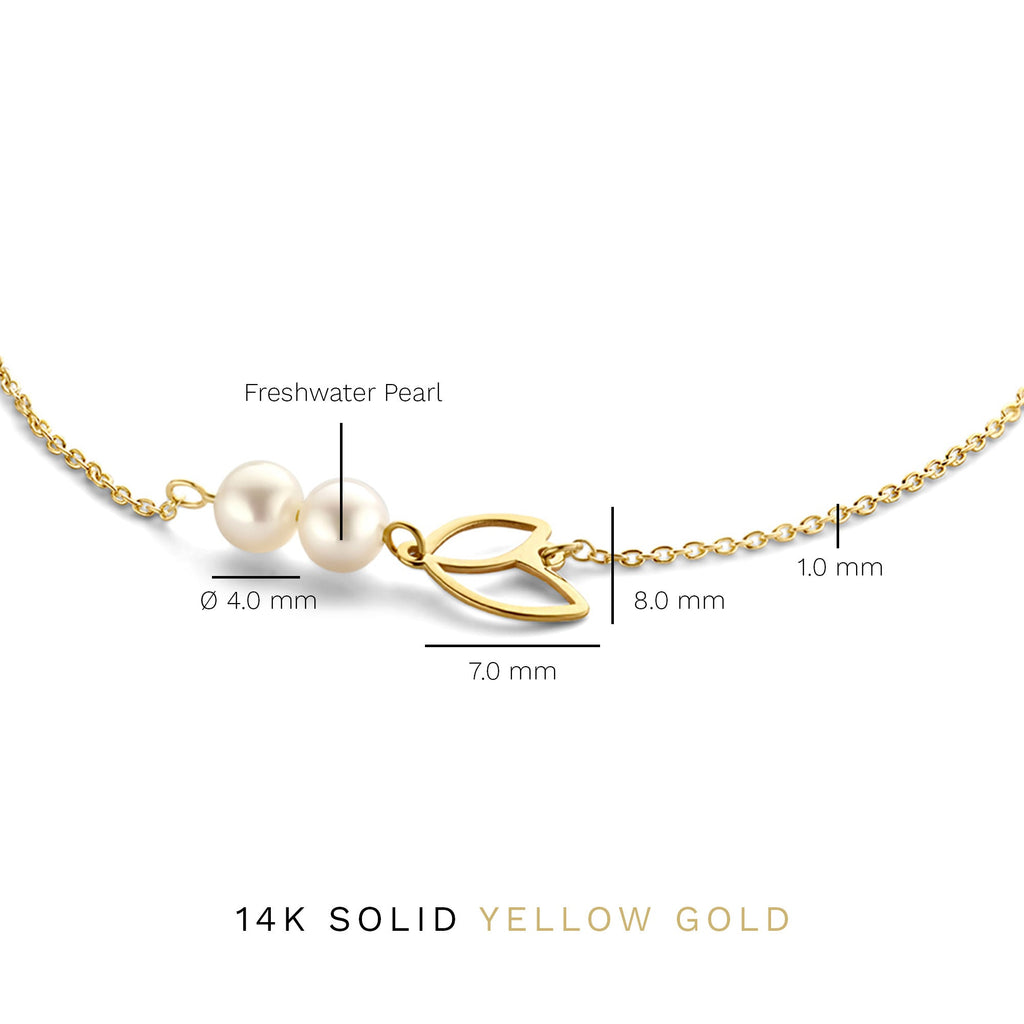 Cadeau d'Isabel 14 karat gold bracelet and ear studs set with pearls