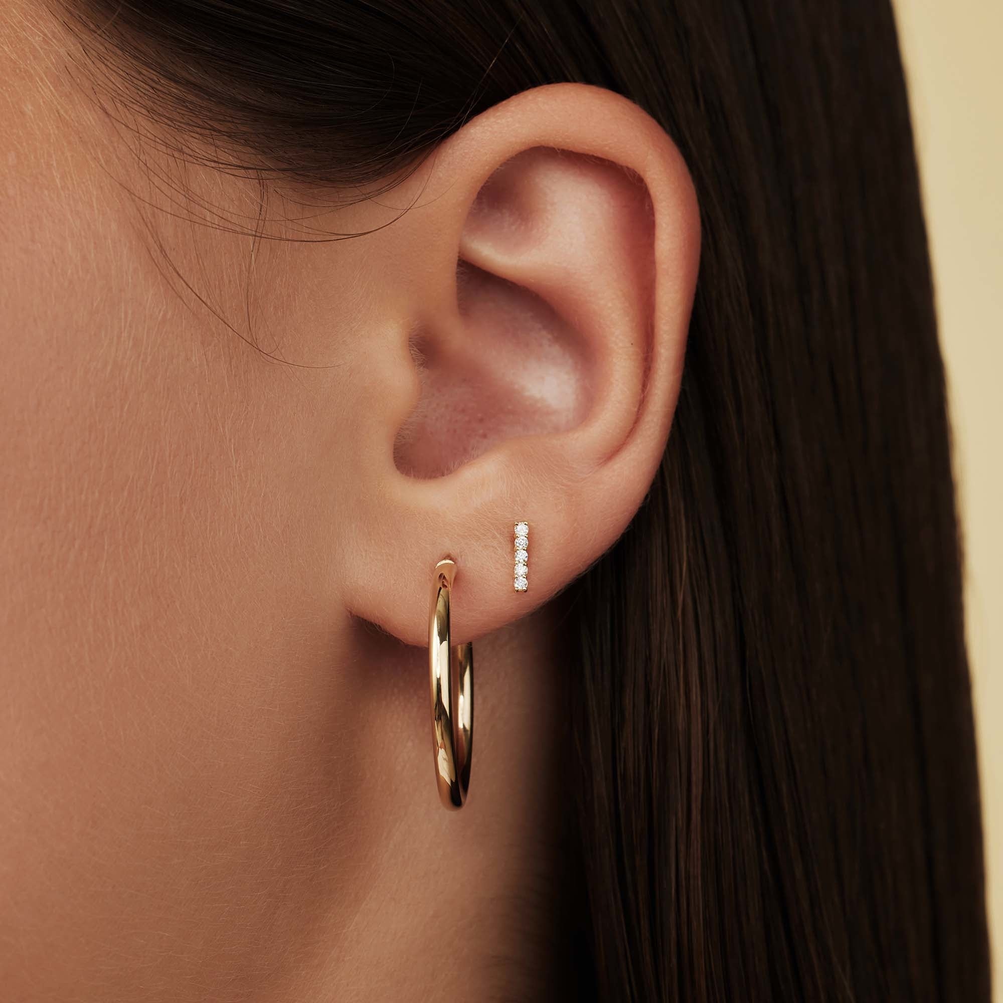 Rivoli Esmée 14 karat gold ear studs with zirconia stones