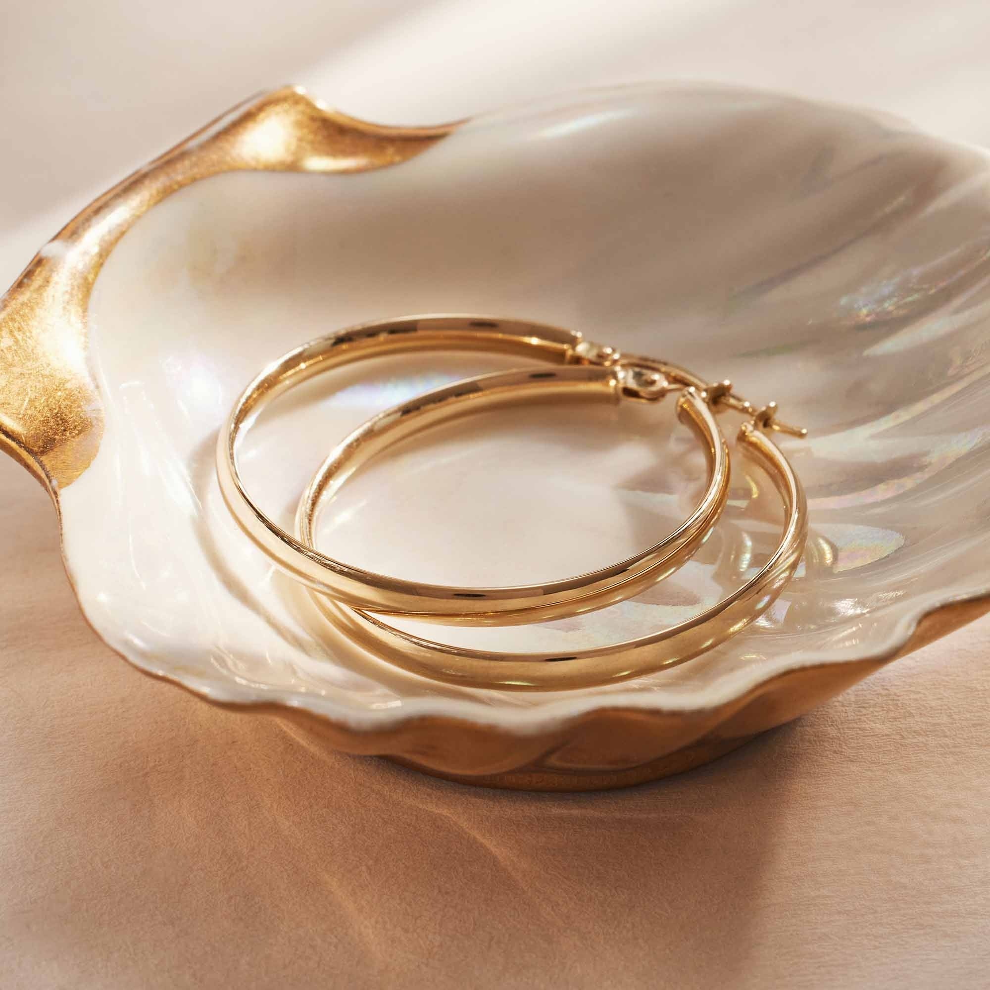 Rivoli Estrella 14 karat gold hoop earrings (32 mm)