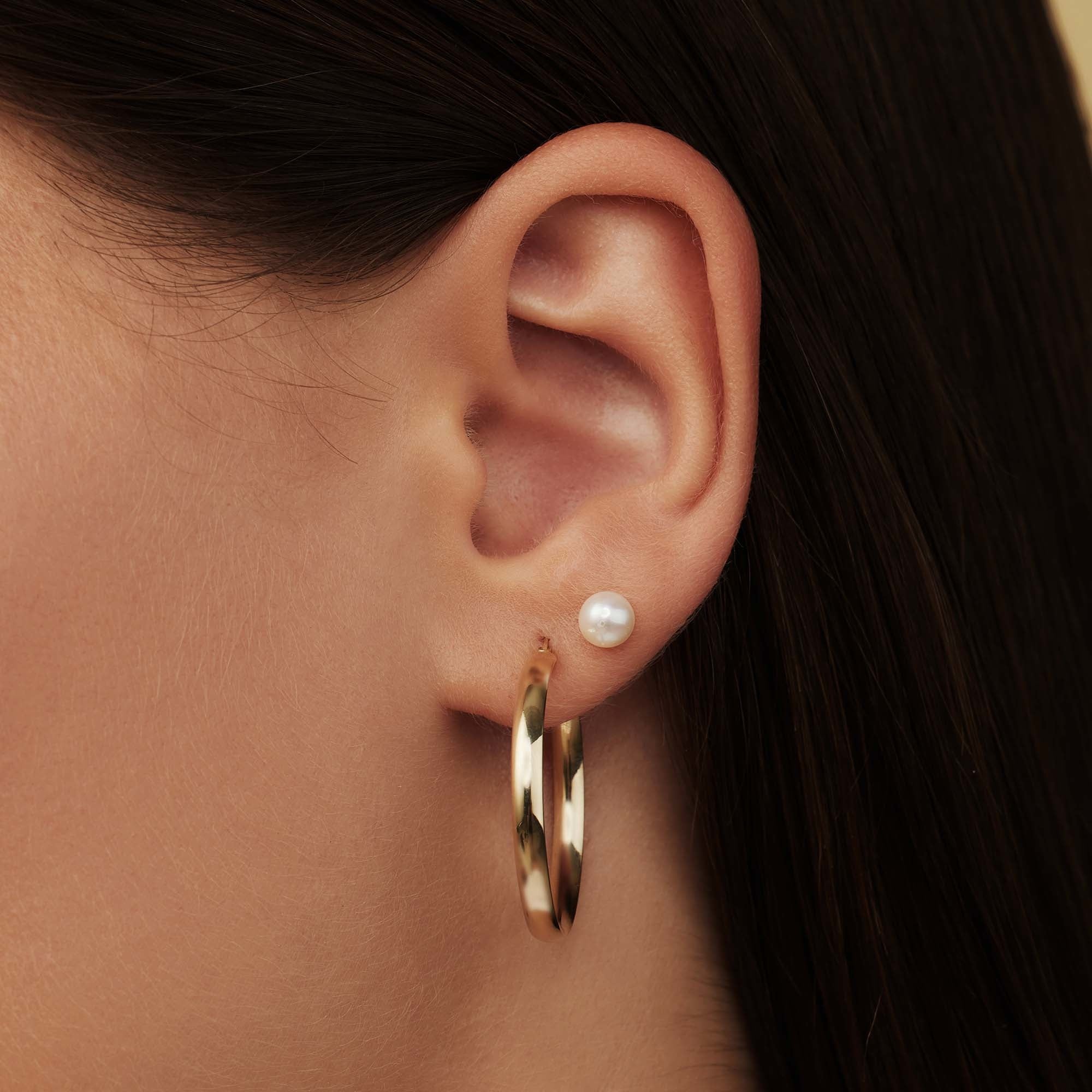 Rivoli Estrella 14 karat gold hoop earrings (27 mm)