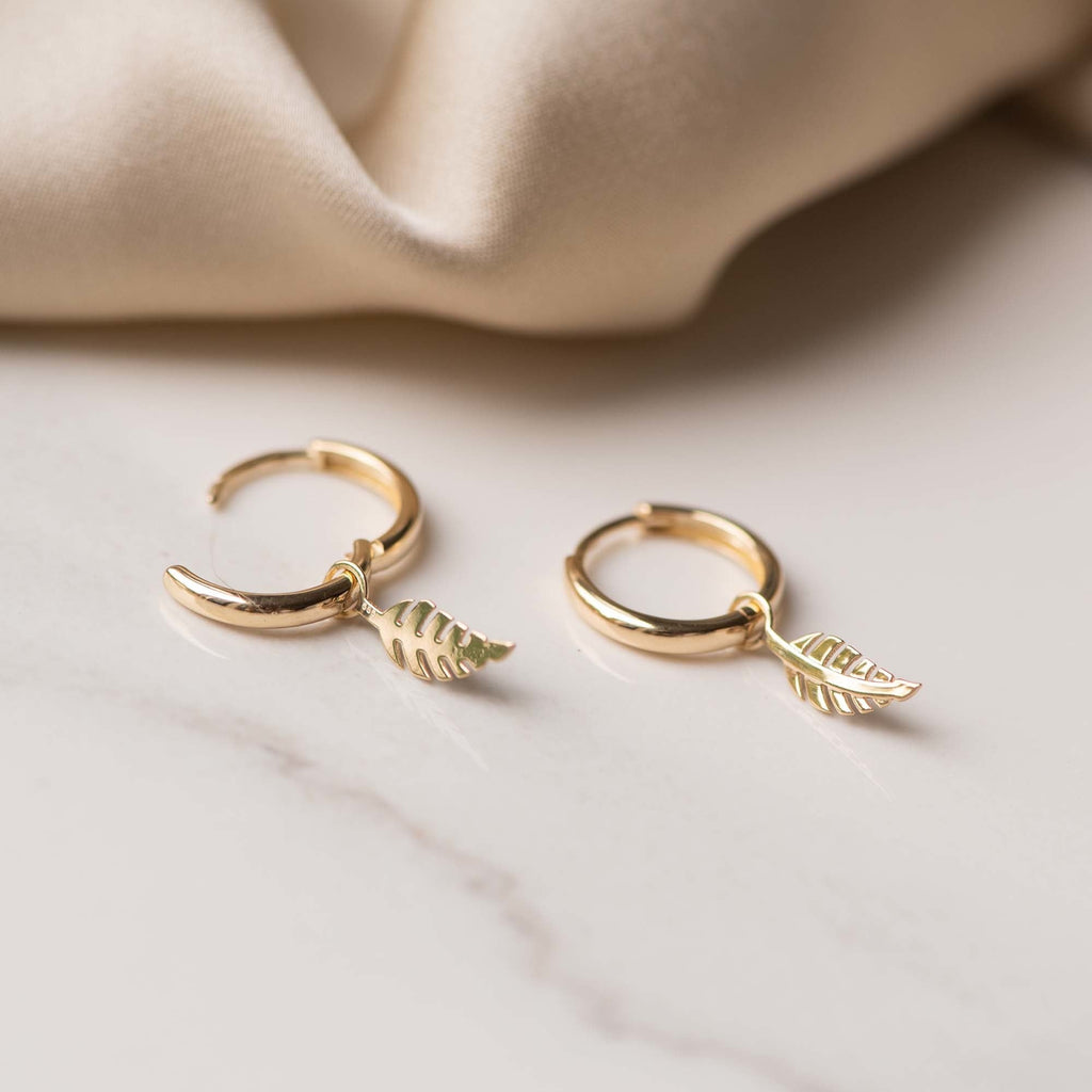 Monceau Giselle 14 karat gold hoop earrings with feather
