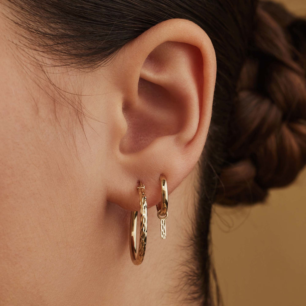 Rivoli Laura 14 karat gold hoop earrings with diamond cut