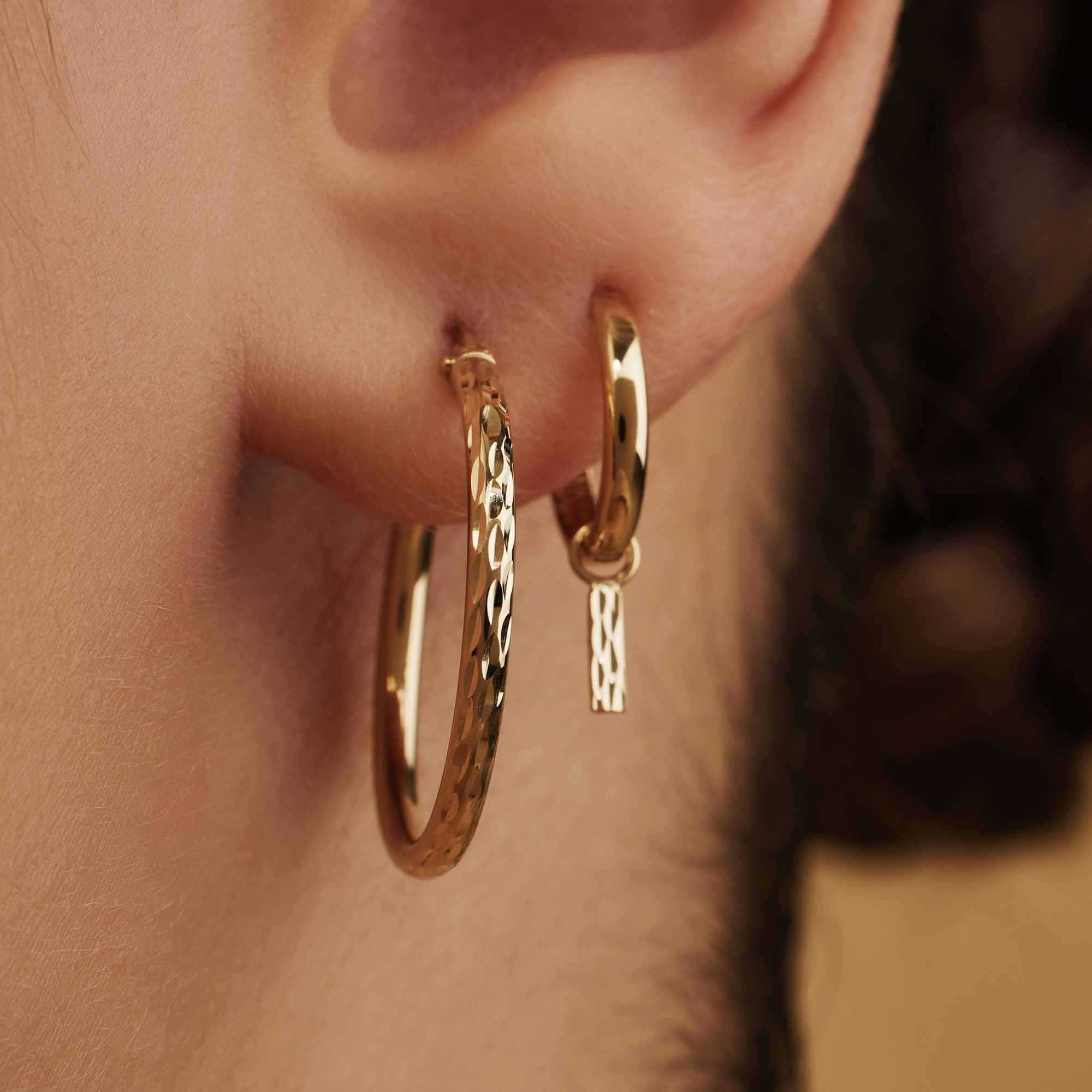 Rivoli Laura 14 karat gold hoop earrings with diamond cut