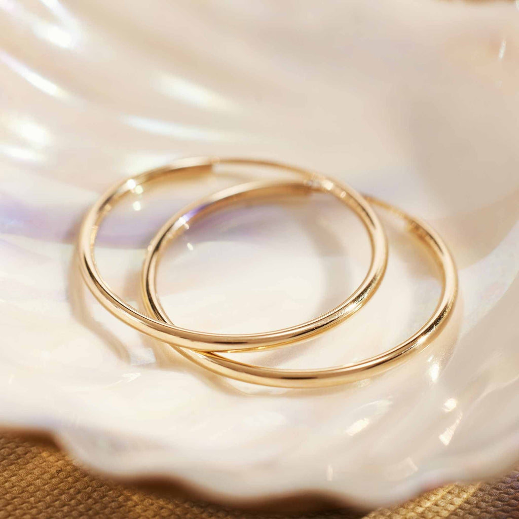 Le Marais Cerise 14 karat gold hoop earrings (25 mm)