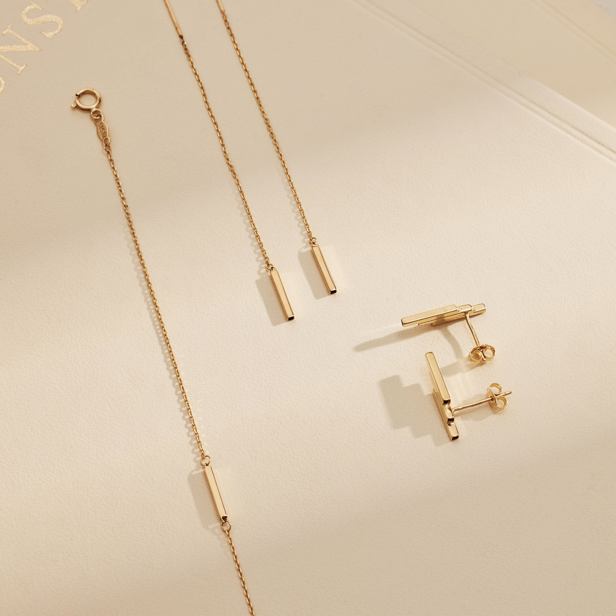 Le Marais Rosalie 14 karat gold pull through earrings with rod