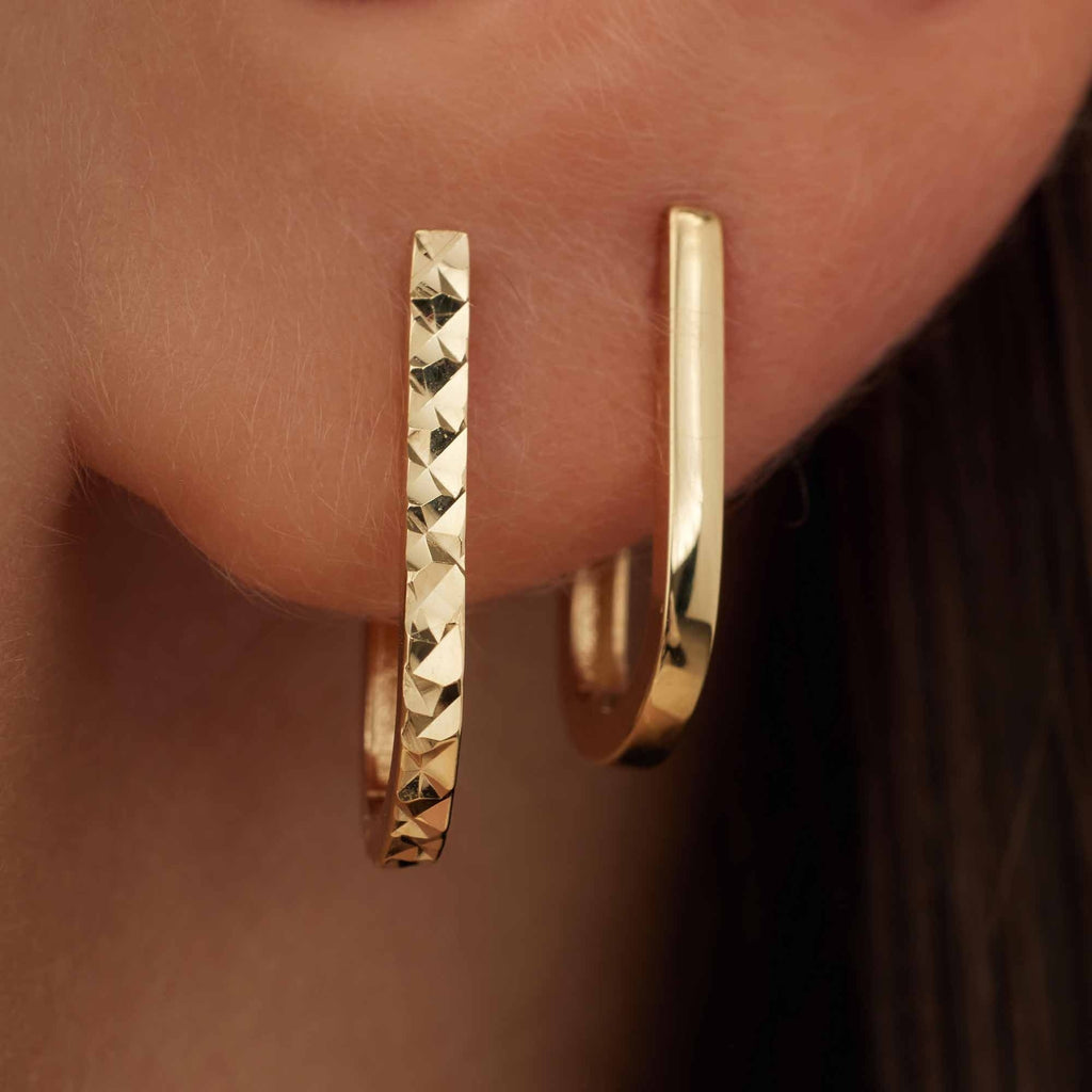 Rivoli Laura 14 karat gold drop earrings with diamond cut