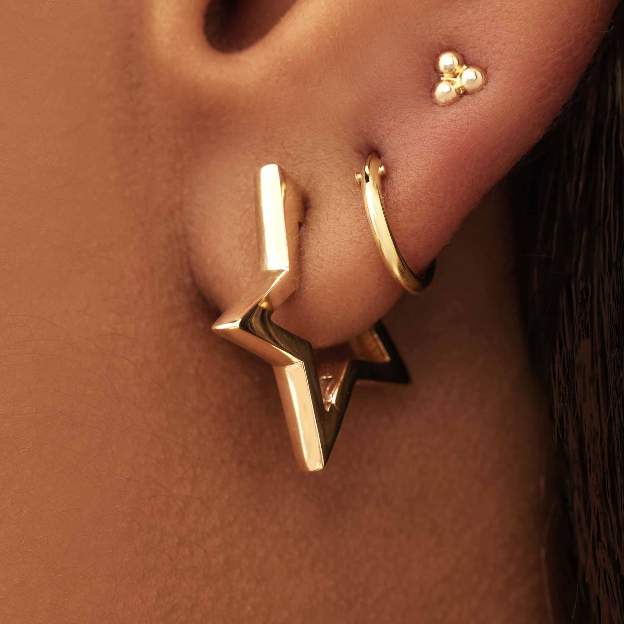 Monceau Juene 14 karat gold star earrings