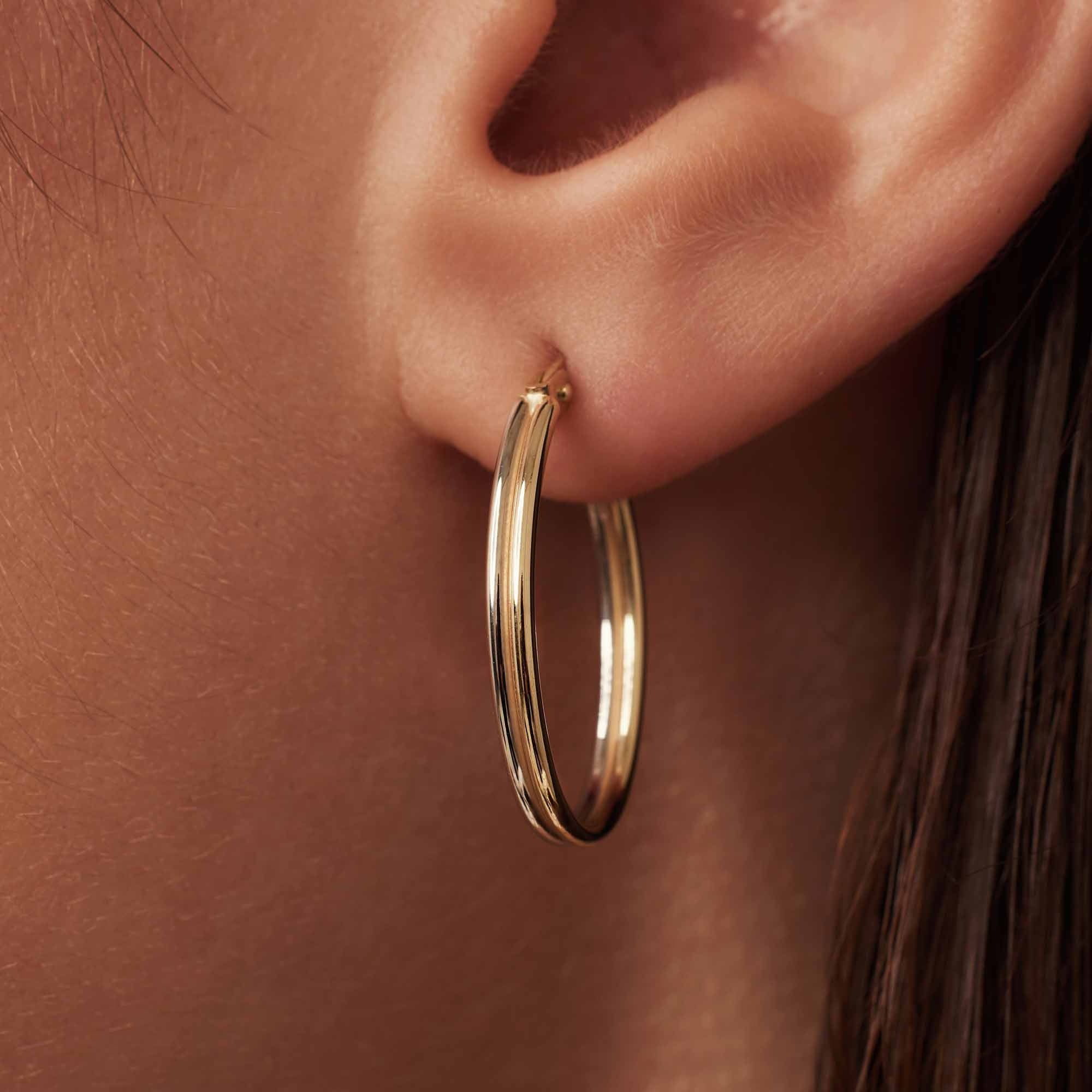 Rivoli Flori 14 karat gold hoop earrings (24 mm)