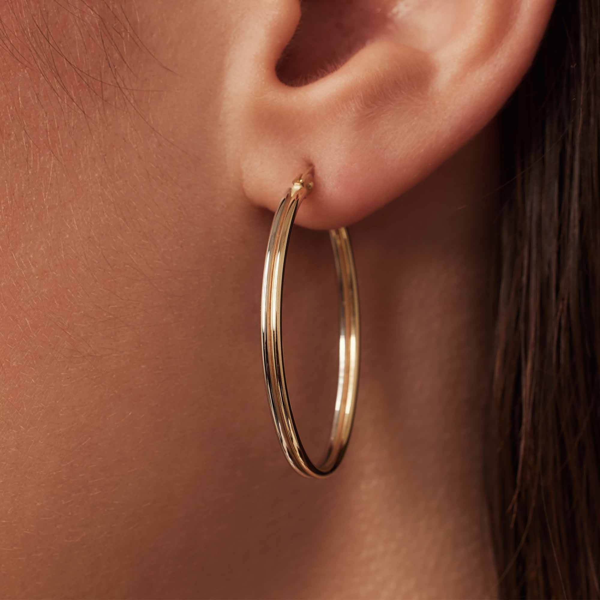 Rivoli Flori 14 karat gold hoop earrings (34 mm)