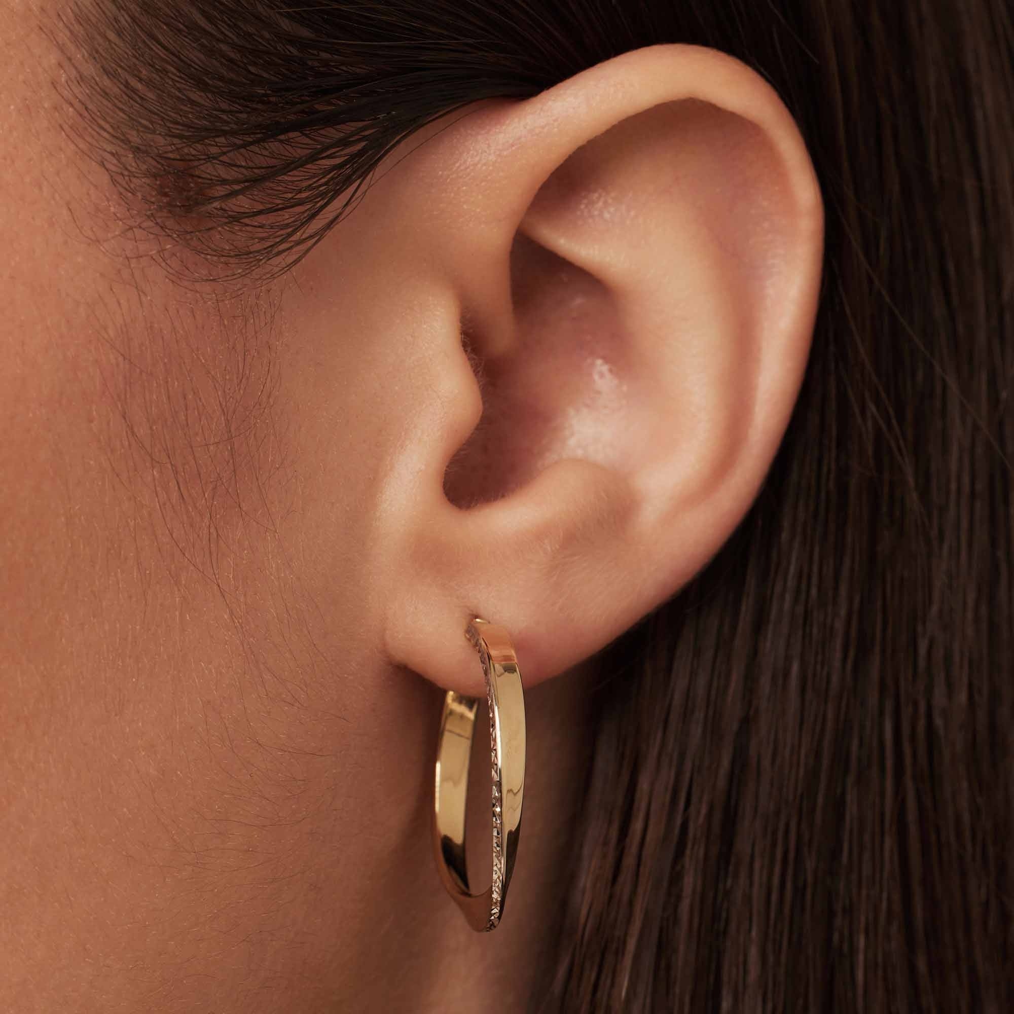 Rivoli Laura 14 karat gold hoop earrings with diamond cut (24 mm)