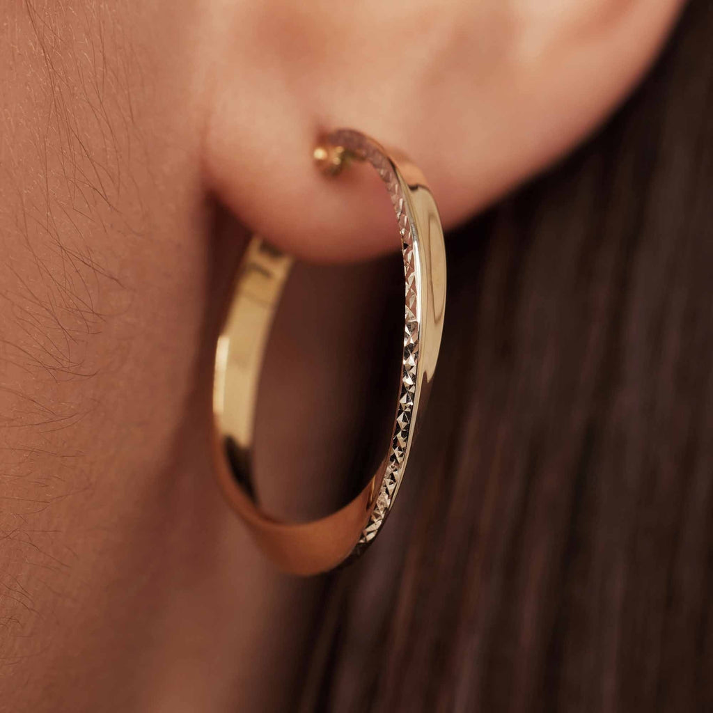 Rivoli Laura 14 karat gold hoop earrings with diamond cut (24 mm)