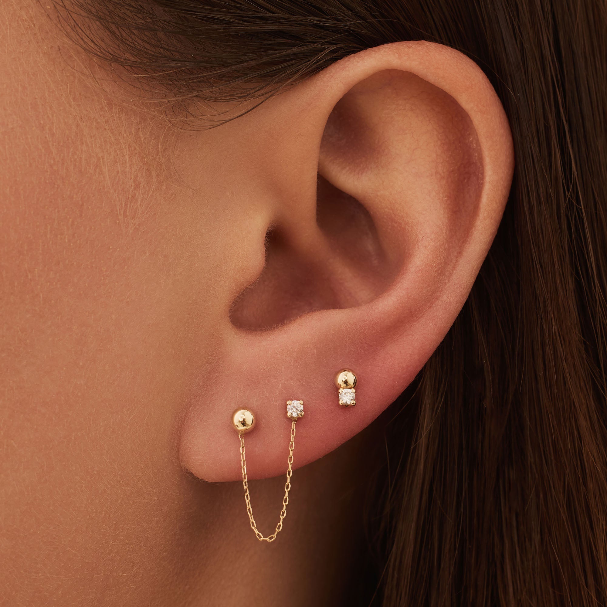 Rivoli Cézanne 14 karat gold earrings with 3 ear studs with zirconia