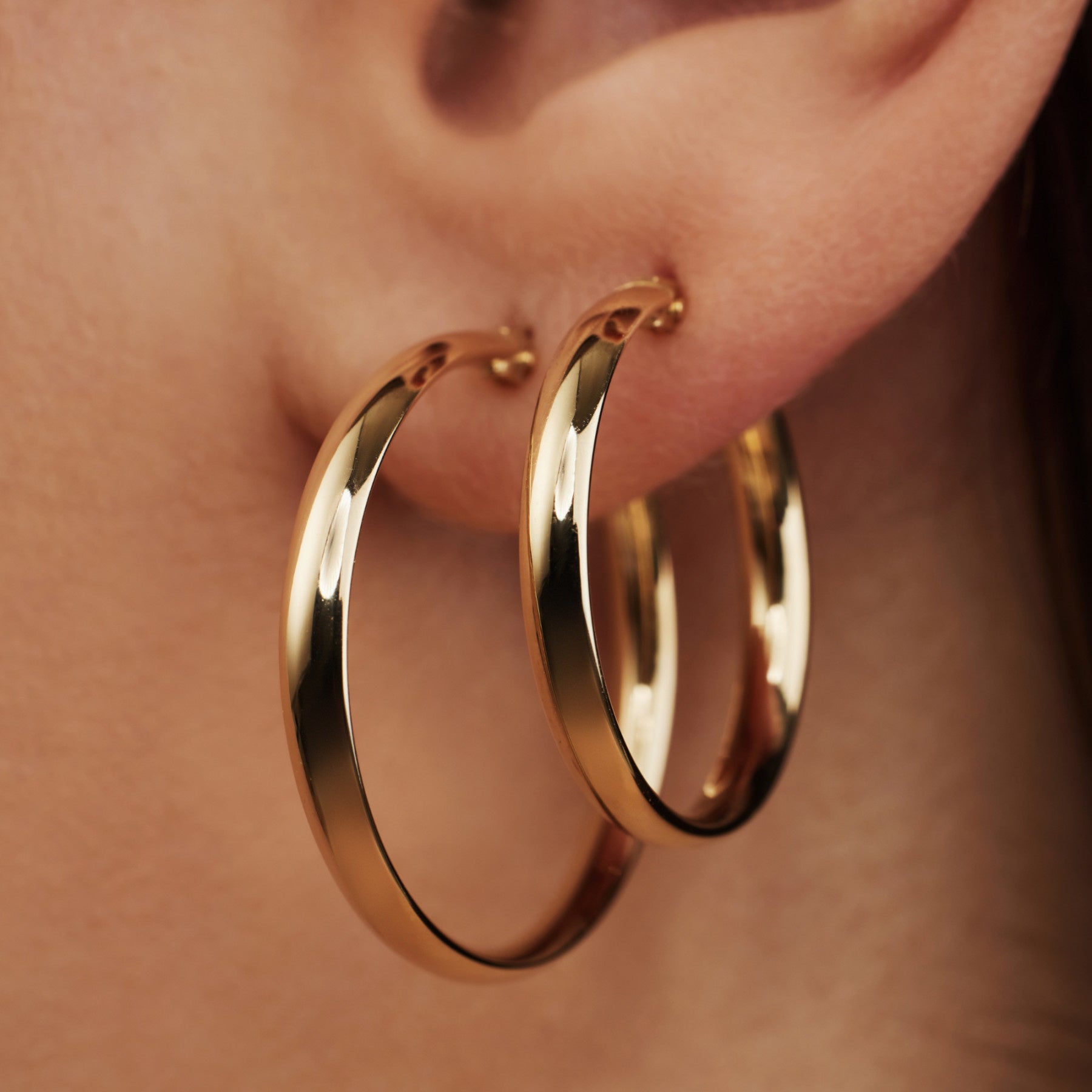 Cadeau d'Isabel 14 karat gold earring set