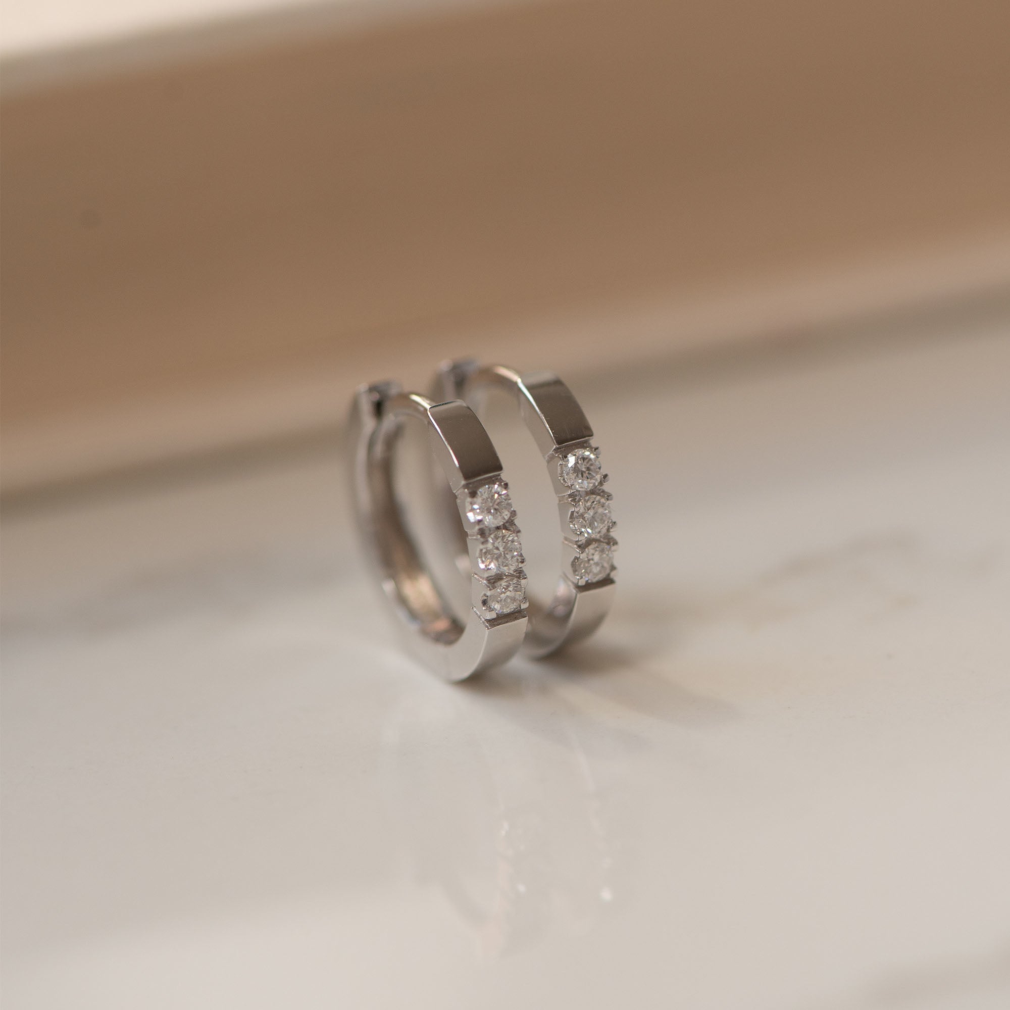 De la Paix Madeline 14 karat white gold earrings with diamond 0.15 ct